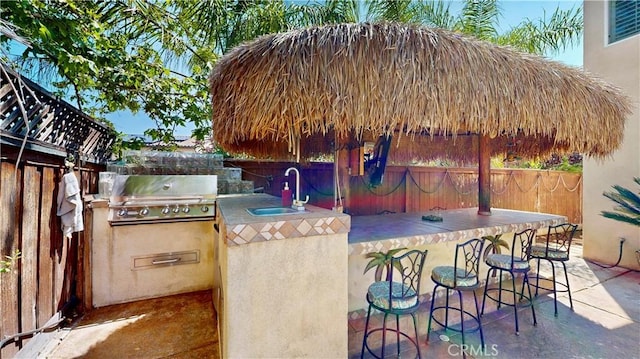 29456 Green Side Ct, Murrieta, CA 92563 - view of patio / terrace with grilling area, exterior kitchen, and fence