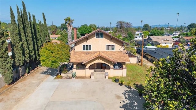 4536 N Irwindale Ave, Covina, CA 91722 - view of front of home featuring stucco siding and fence