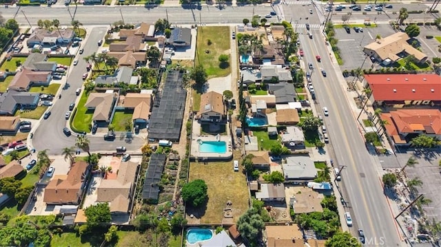 4536 N Irwindale Ave, Covina, CA 91722 - aerial view of property's location featuring a pool, nearby suburban area, and a main thoroughfare