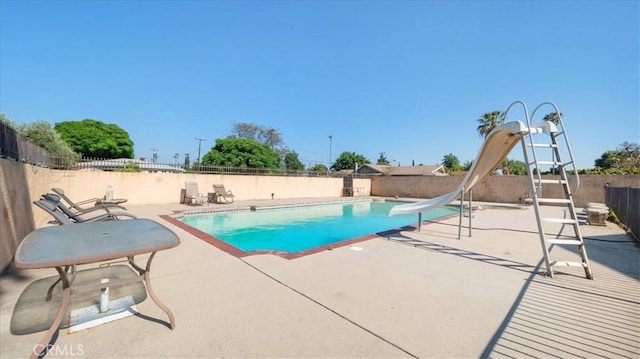 4536 N Irwindale Ave, Covina, CA 91722 - view of pool featuring a water slide, a patio, and a fenced backyard