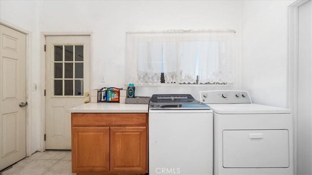 4536 N Irwindale Ave, Covina, CA 91722 - laundry room with independent washer and dryer, light tile patterned flooring, and cabinet space
