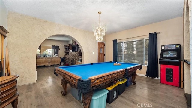 4536 N Irwindale Ave, Covina, CA 91722 - game room featuring arched walkways, wood finished floors, a chandelier, billiards, and a textured ceiling