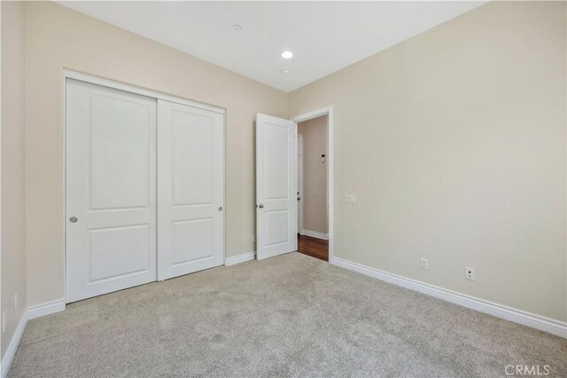 51 Carrington, Irvine, CA 92620 - unfurnished bedroom with carpet floors, a closet, and recessed lighting