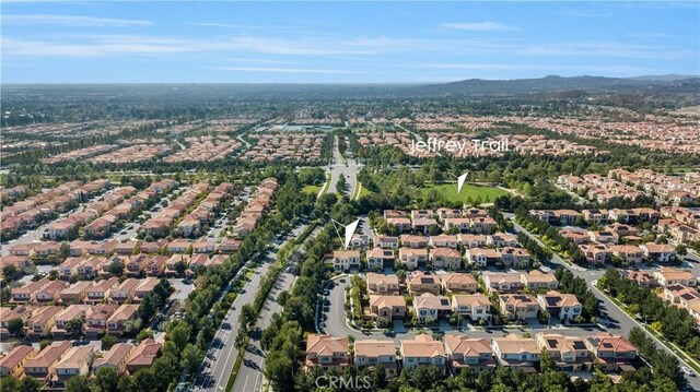 51 Carrington, Irvine, CA 92620 - aerial view of property and surrounding area featuring nearby suburban area and a mountainous background
