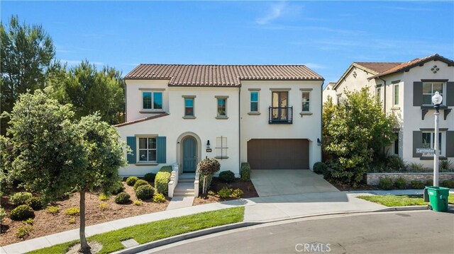 51 Carrington, Irvine, CA 92620 - mediterranean / spanish home with a tiled roof, stucco siding, a garage, and concrete driveway