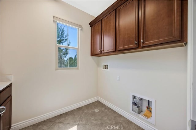51 Carrington, Irvine, CA 92620 - laundry area with cabinet space, hookup for a washing machine, and tile patterned flooring