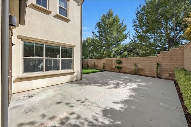 51 Carrington, Irvine, CA 92620 - fenced backyard featuring a patio