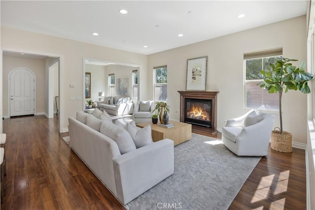 51 Carrington, Irvine, CA 92620 - living area featuring dark wood-style flooring, recessed lighting, and a glass covered fireplace