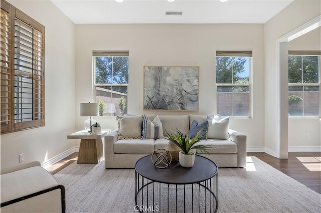 51 Carrington, Irvine, CA 92620 - living area featuring wood finished floors and recessed lighting