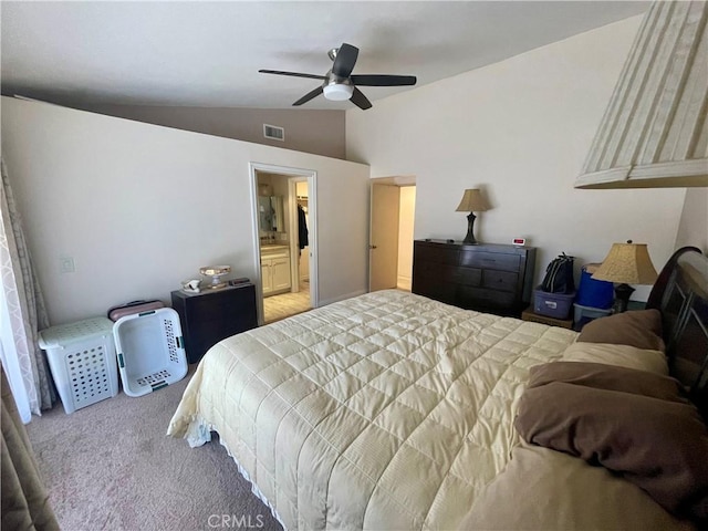 bedroom featuring lofted ceiling, carpet, and a ceiling fan