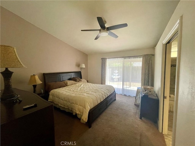 bedroom featuring access to exterior, carpet flooring, vaulted ceiling, and ceiling fan