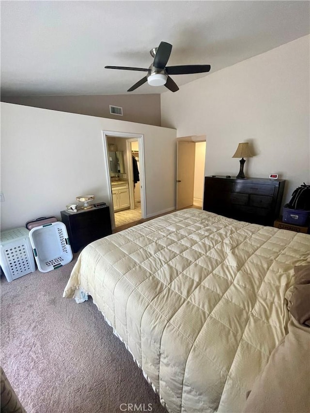 bedroom featuring lofted ceiling, carpet floors, and ceiling fan