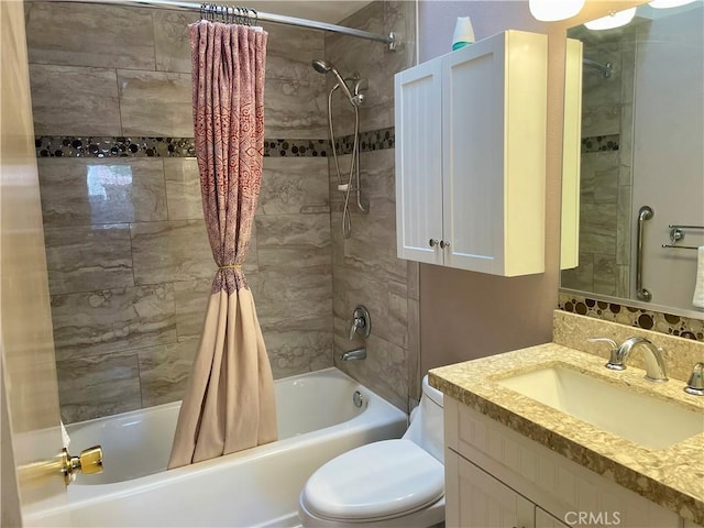 bathroom with shower / tub combo, vanity, and toilet