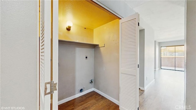 9020 Newport Ave Unit 17, Fontana, CA 92335 - washroom featuring electric dryer hookup, wood finished floors, and baseboards