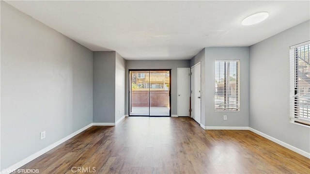 9020 Newport Ave Unit 17, Fontana, CA 92335 - spare room featuring wood finished floors and baseboards