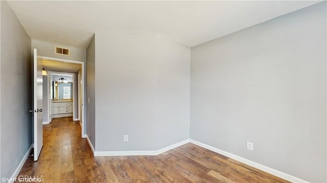 9020 Newport Ave Unit 17, Fontana, CA 92335 - empty room with wood finished floors and baseboards