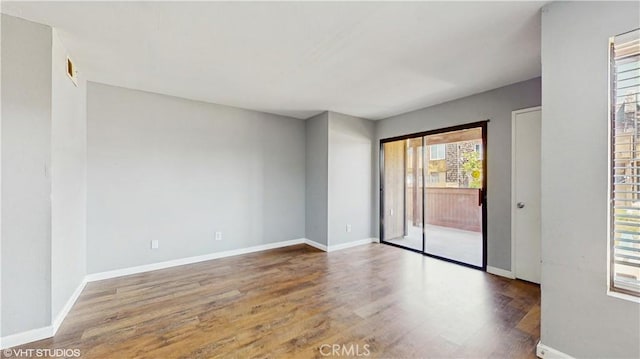 9020 Newport Ave Unit 17, Fontana, CA 92335 - spare room featuring wood finished floors and baseboards