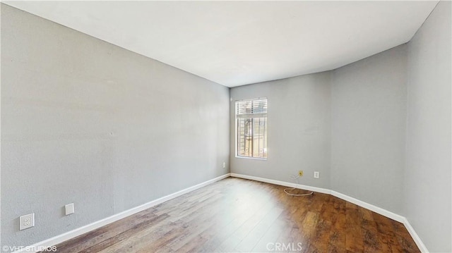 9020 Newport Ave Unit 17, Fontana, CA 92335 - unfurnished room with wood finished floors and baseboards