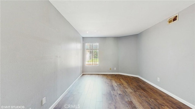 9020 Newport Ave Unit 17, Fontana, CA 92335 - empty room with wood finished floors and baseboards