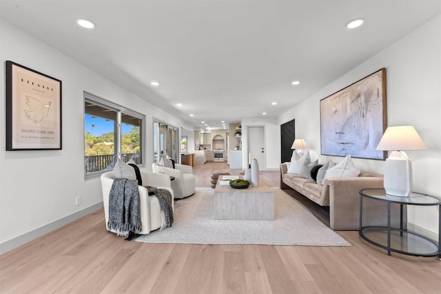 5740 Daffodil Ln, San Diego, CA 92120 - living room with wood finished floors, recessed lighting, and baseboards