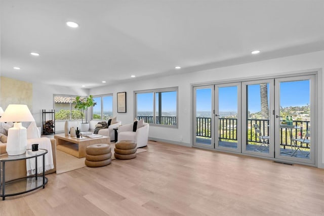 5740 Daffodil Ln, San Diego, CA 92120 - living room featuring wood finished floors, recessed lighting, and baseboards