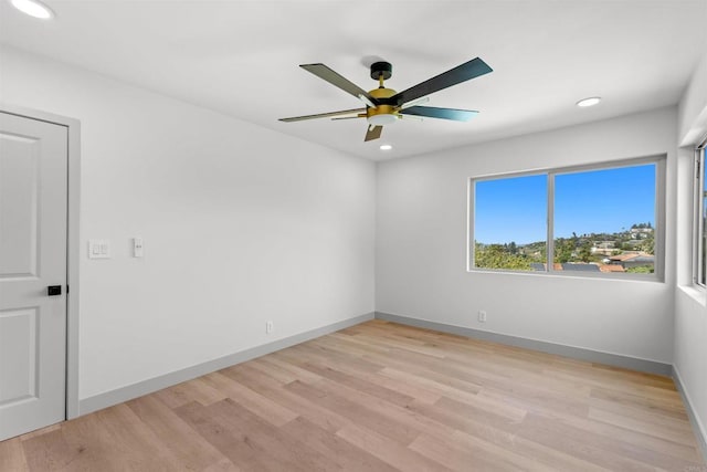 5740 Daffodil Ln, San Diego, CA 92120 - spare room featuring a ceiling fan, light wood-type flooring, recessed lighting, and baseboards