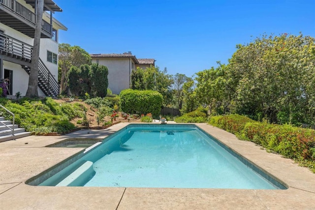 5740 Daffodil Ln, San Diego, CA 92120 - view of swimming pool featuring stairway and a pool with connected hot tub