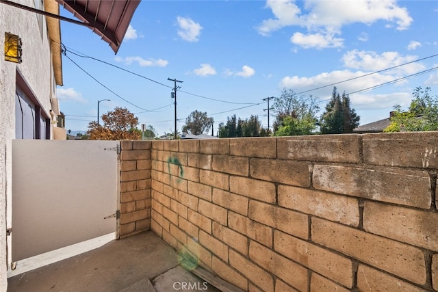 view of patio with fence
