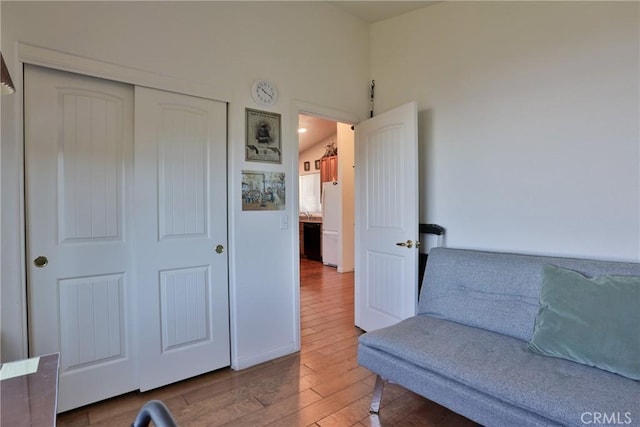 unfurnished room with wood finished floors