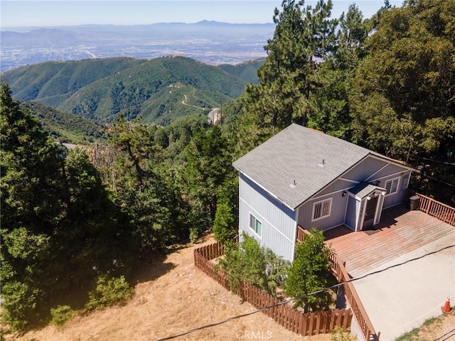 view from above of property with a mountain backdrop