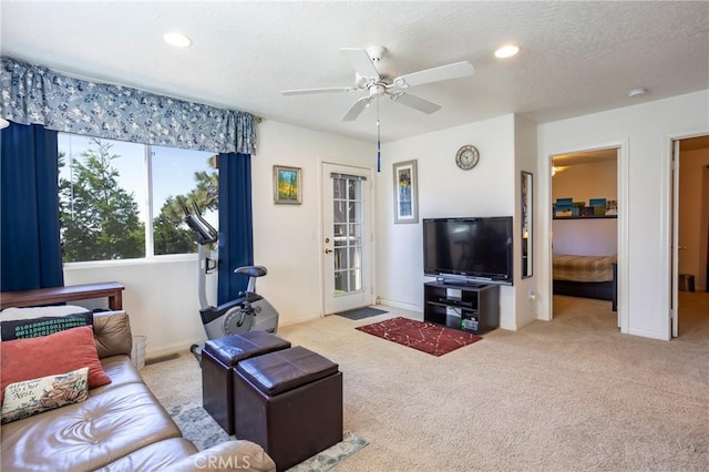 living room with carpet, ceiling fan, baseboards, and recessed lighting