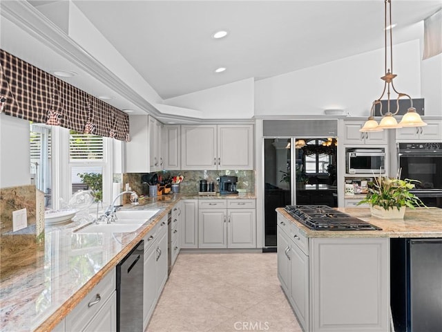 kitchen with black appliances, a sink, tasteful backsplash, recessed lighting, and pendant lighting