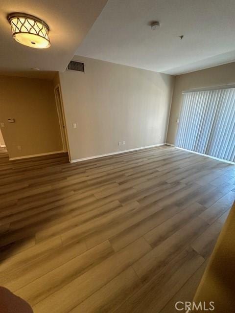 31256 Taylor Ln, Temecula, CA 92592 - empty room with wood finished floors and baseboards