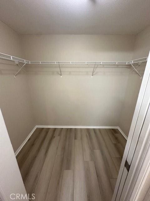 31256 Taylor Ln, Temecula, CA 92592 - spacious closet featuring wood finished floors