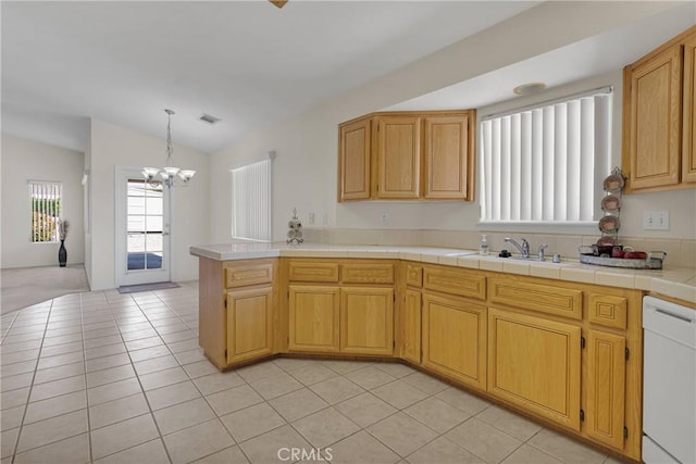 19115 Seneca, Apple Valley, CA 92307 - kitchen featuring dishwasher, a chandelier, a sink, light tile patterned floors, and lofted ceiling