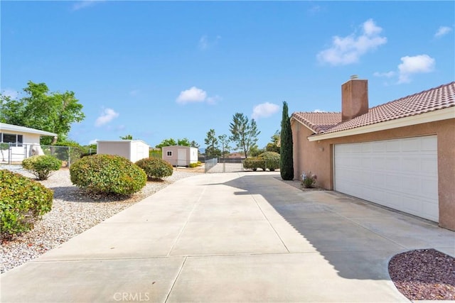 19115 Seneca, Apple Valley, CA 92307 - view of concrete surface with a gate