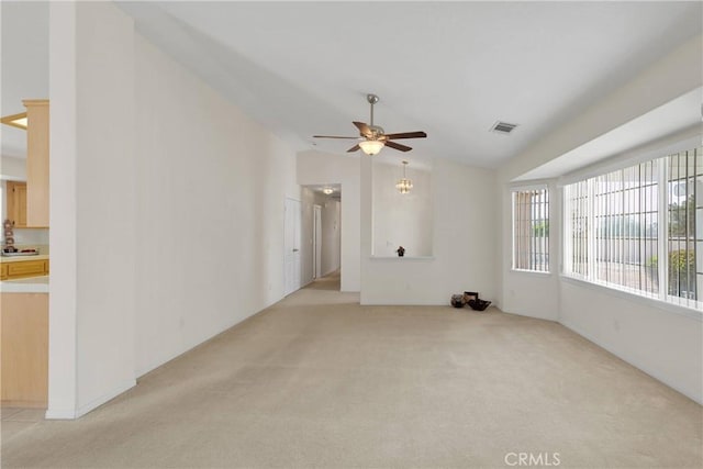 19115 Seneca, Apple Valley, CA 92307 - spare room featuring light colored carpet, ceiling fan, and lofted ceiling