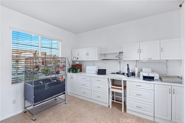 35475 Calendula Cir, Winchester, CA 92596 - office space with light tile patterned flooring and built in study area