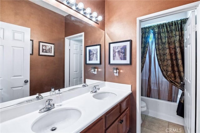 35475 Calendula Cir, Winchester, CA 92596 - bathroom with toilet, tile patterned flooring, double vanity, a textured wall, and shower / bath combination with curtain