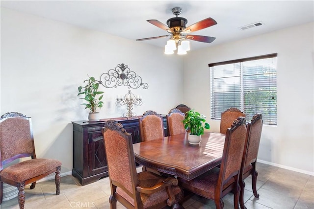 35475 Calendula Cir, Winchester, CA 92596 - dining room with ceiling fan, light tile patterned flooring, and baseboards