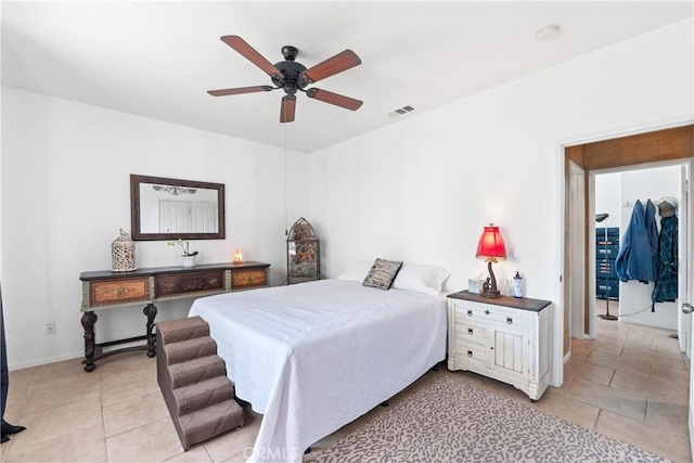 35475 Calendula Cir, Winchester, CA 92596 - bedroom with light tile patterned flooring, ceiling fan, and baseboards