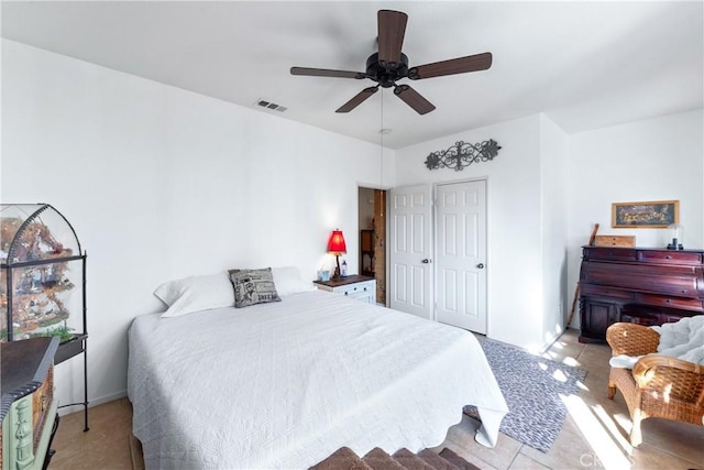 35475 Calendula Cir, Winchester, CA 92596 - tiled bedroom with a ceiling fan, a closet, and baseboards