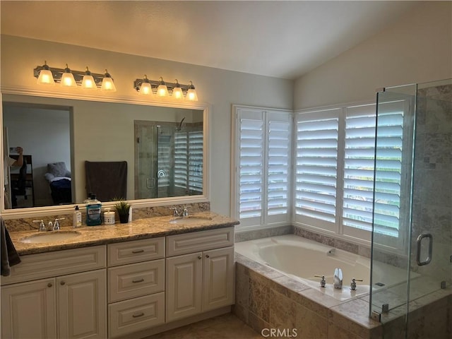 13564 Esprit Ave, San Diego, CA 92128 - bathroom with a shower stall, a bath, lofted ceiling, double vanity, and tile patterned flooring