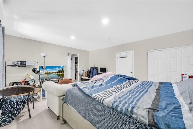 1451 W 10th St, Pomona, CA 91766 - bedroom with a closet, recessed lighting, and light wood-style flooring