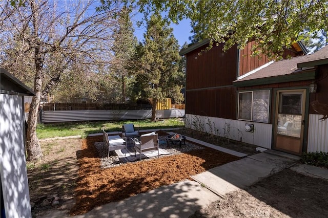 615 Elysian Blvd, Big Bear City, CA 92314 - view of yard with an outdoor fire pit, fence, and a patio area