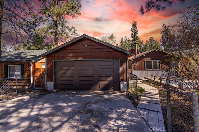 615 Elysian Blvd, Big Bear City, CA 92314 - chalet / cabin with driveway, fence, and a gate