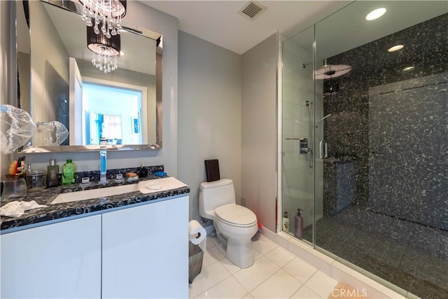 bathroom with toilet, tile patterned floors, a shower stall, vanity, and recessed lighting