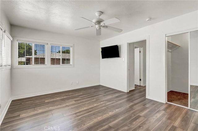 109 Lorita Way, Hanford, CA 93230 - unfurnished bedroom featuring wood finished floors, baseboards, ceiling fan, and a closet