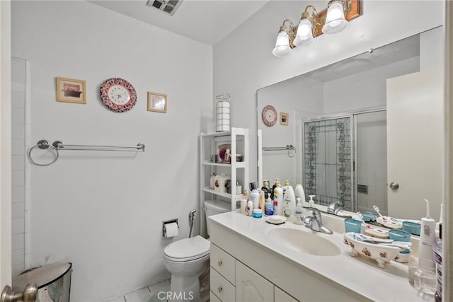 11242 Kamloops St, Sylmar, CA 91342 - full bathroom featuring a shower stall, toilet, tile patterned floors, and vanity