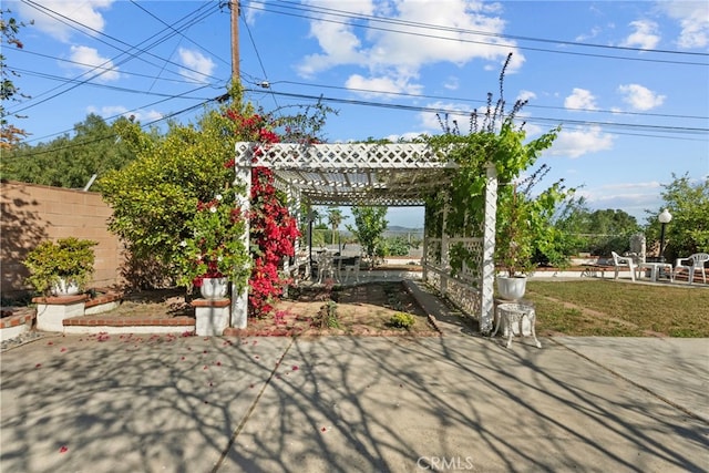 11242 Kamloops St, Sylmar, CA 91342 - view of patio / terrace with a pergola and fence